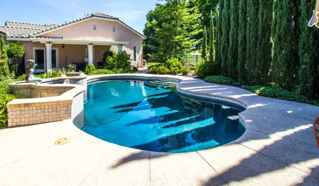 Swimming Pool In Serene Rear Yard Setting