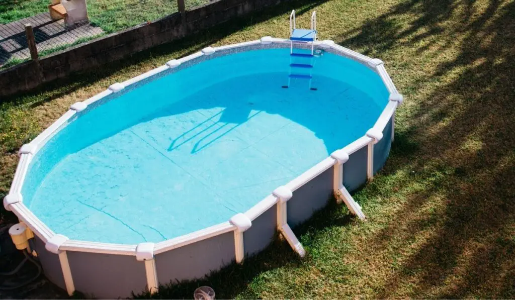 Above Ground Swimming Pool with Blue Water 