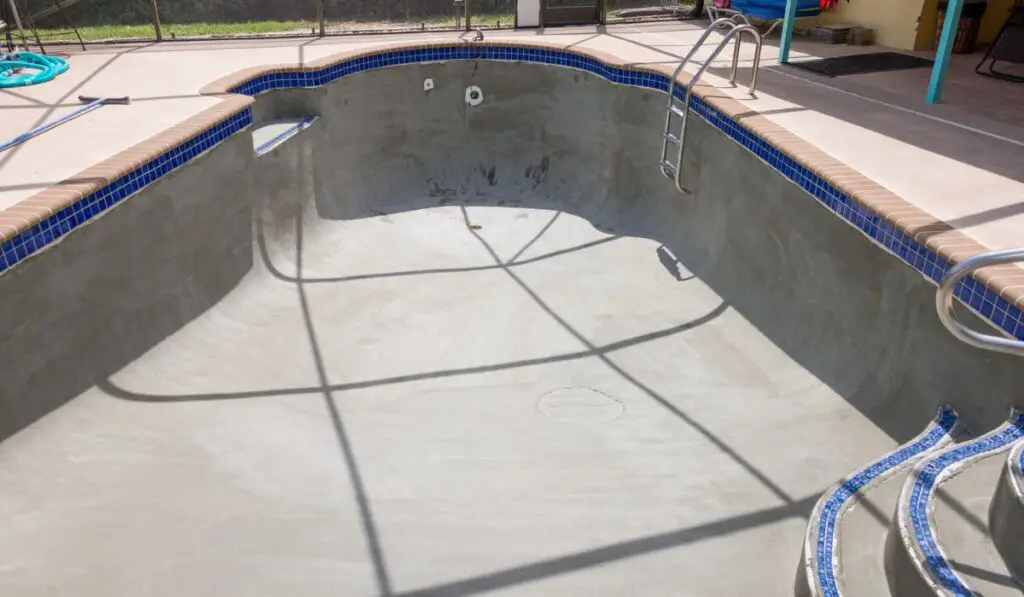 Pool resurfacing and gray cement bond coat