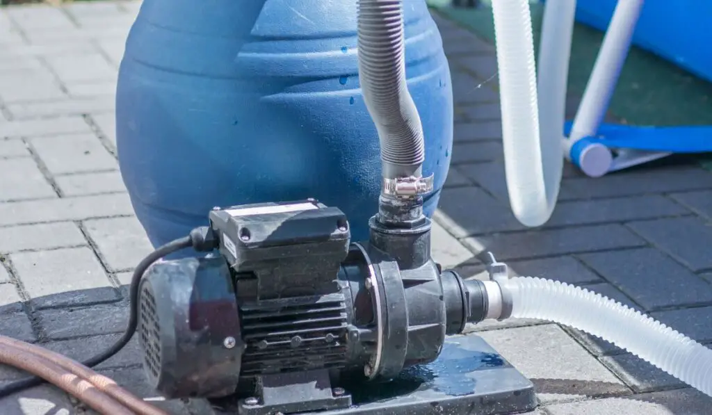 Sand filter with pump on a pool to keep the pool water clean 