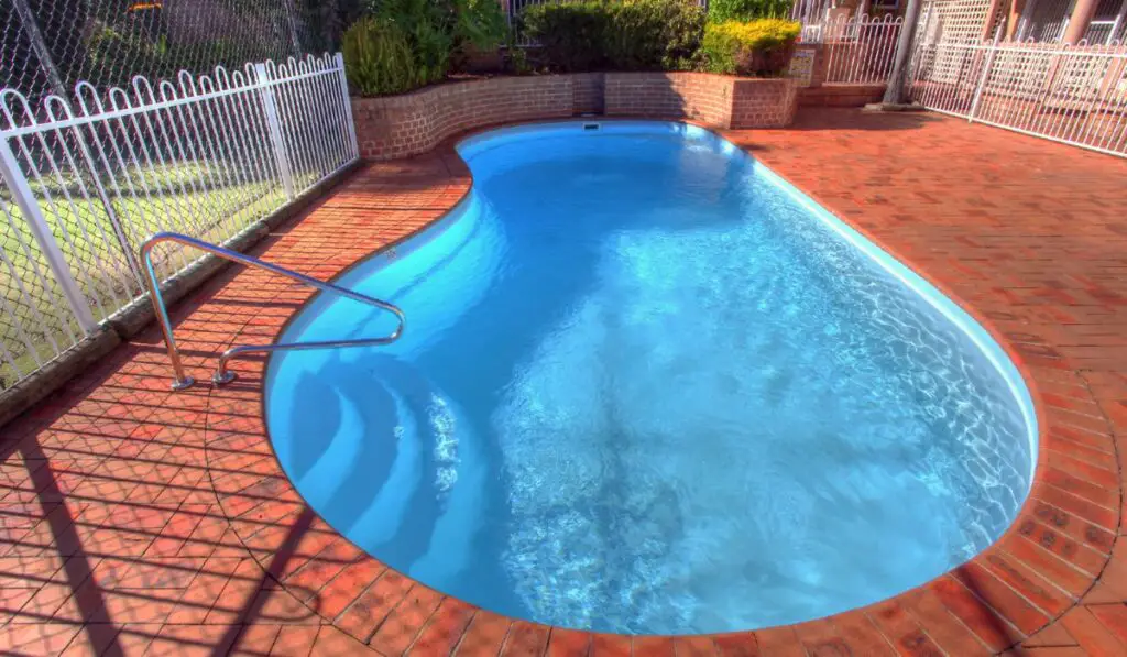 Modern backyard with swimming pool 