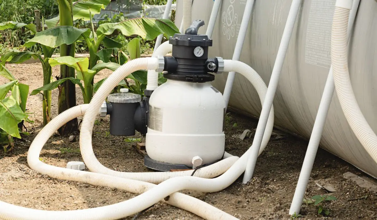 Sand filter plant at a pool in the backyard