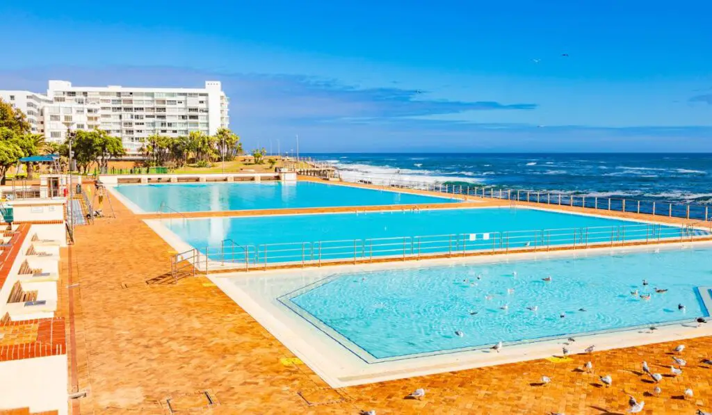 View of Pavilion Public Swimming Pool on Sea Point promenade in Cape Town