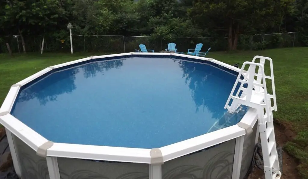 Above ground round swimming pool with ladder