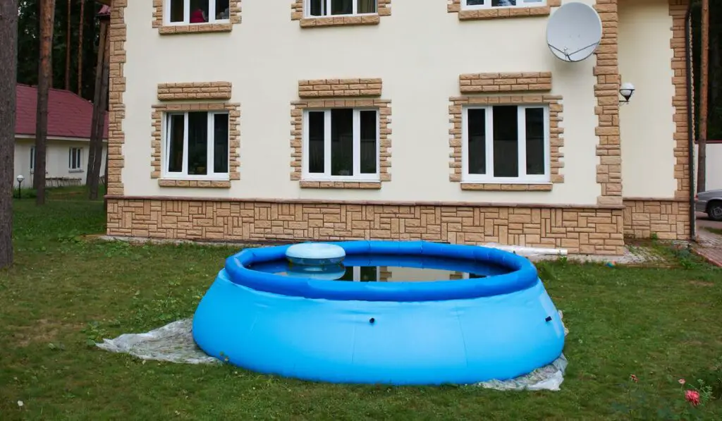 Big house out of town and an inflatable pool