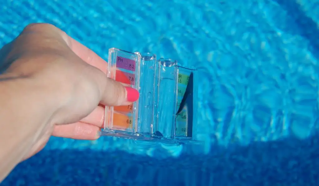 Water Testing Kit Gathering a Pool Sample